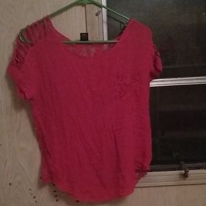A pink shirt with mesh backing